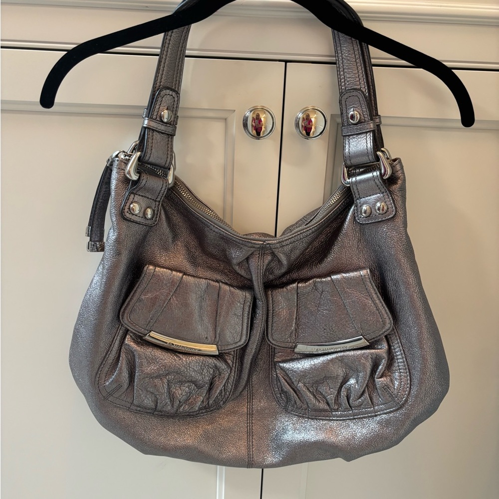 B. Makowsky Metallic silver Hobo Bag and leopard print interior